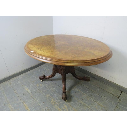 767 - A Victorian burr walnut oval loo table, the cross-banded top with marquetry inlay, on a cluster colu... 