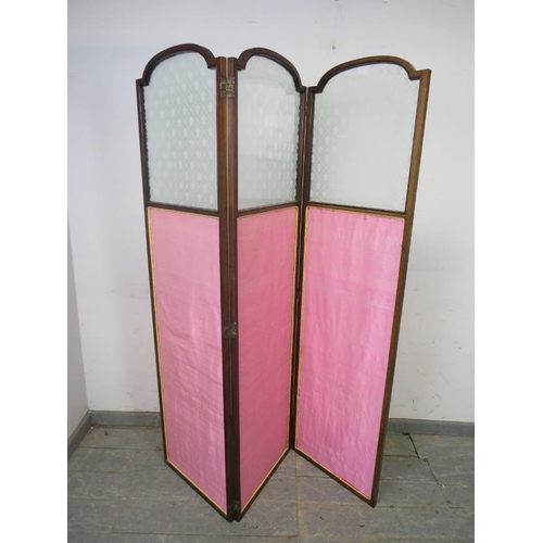 773 - An Edwardian mahogany three-section folding modesty screen strung with satinwood, the upper section ... 