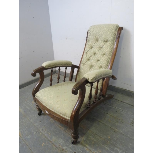 774 - A Victorian oak open-sided armchair with reclining mechanism, reupholstered in good quality buttoned... 