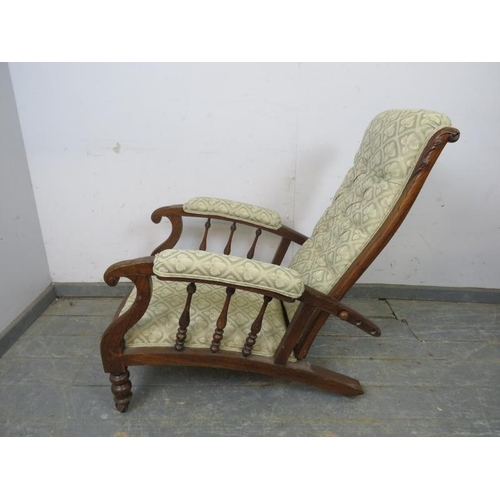 774 - A Victorian oak open-sided armchair with reclining mechanism, reupholstered in good quality buttoned... 