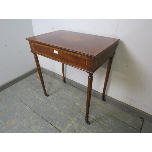 795 - An Edwardian mahogany side table, having satinwood central panel and crossbanded inlay, housing one ... 