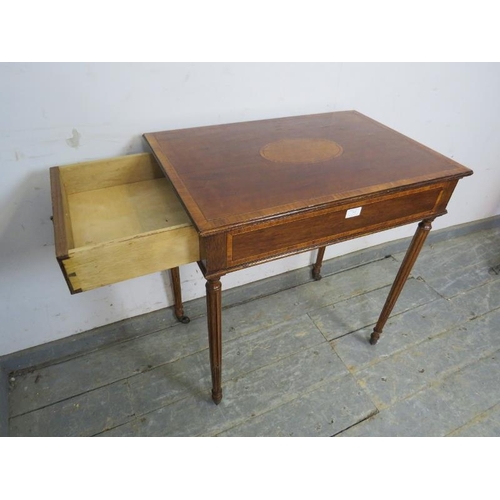 795 - An Edwardian mahogany side table, having satinwood central panel and crossbanded inlay, housing one ... 