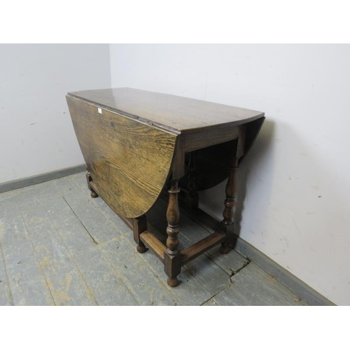 815 - An 18th century and later oak oval gate-leg table, on baluster turned and block supports with stretc... 