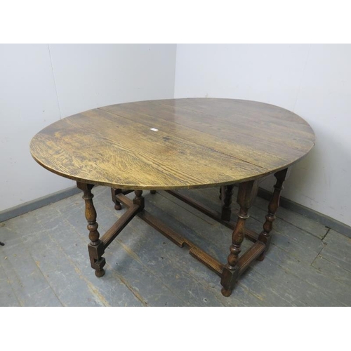 815 - An 18th century and later oak oval gate-leg table, on baluster turned and block supports with stretc... 