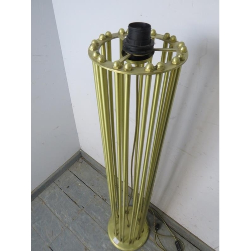 831 - A contemporary gilt brass floor lamp, the cylindrical cluster column on a circular plinth base. 
H12... 