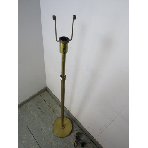 832 - A brass height adjustable floor lamp by Visual Comfort & Co, on a dished circular plinth base. 
H159... 