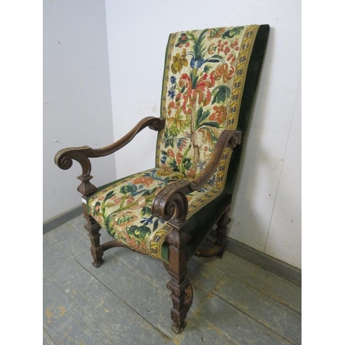 833 - A 19th century Continental fruitwood throne chair, upholstered in green velvet and multi coloured ta... 