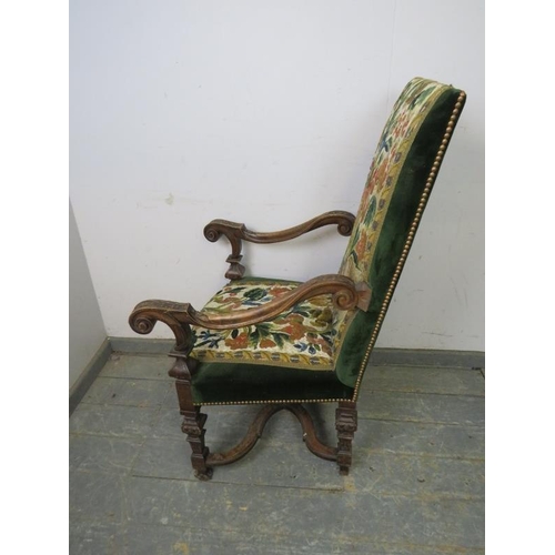 833 - A 19th century Continental fruitwood throne chair, upholstered in green velvet and multi coloured ta... 