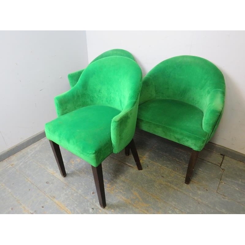 834 - Three tub chairs, upholstered in pea green velvet material with brass studs, on tapered square suppo... 