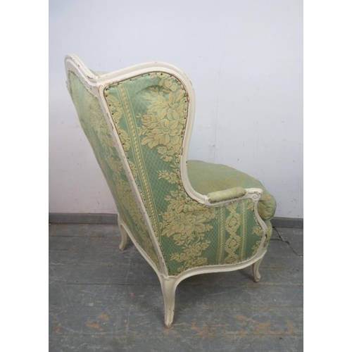 837 - An antique French giltwood wingback armchair, upholstered in pistachio green damask material, on cab... 