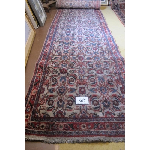 867 - A 20th Century Persian runner, repeat pattern on fawn ground. 480cm x 95cm approx.
Condition report:... 