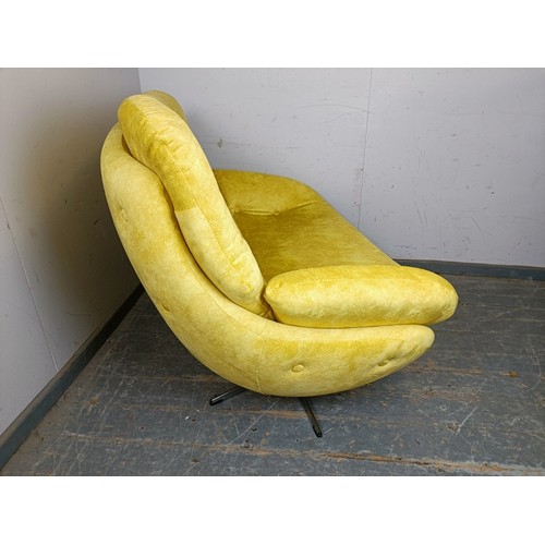 729 - A mid-century two-seater sofa/loveseat, reupholstered in buttoned yellow velvet material, on splayed... 