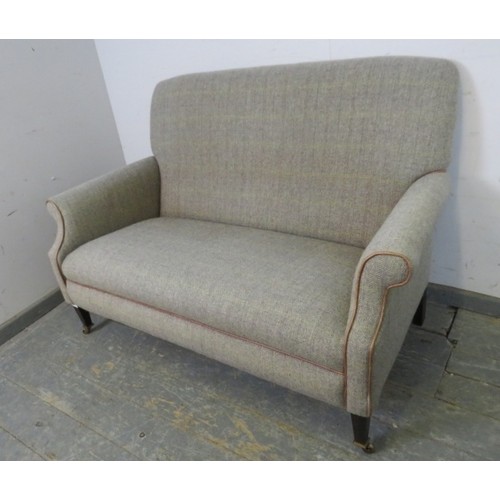 758 - An Edwardian style small two-seater sofa/loveseat by Tetrad, upholstered in Harris tweed with tan le... 