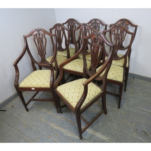 757 - A set of eight (6+2) Georgian Revival mahogany dining chairs in the manner of Hepplewhite, the pierc... 