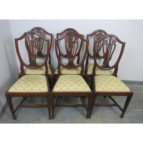 757 - A set of eight (6+2) Georgian Revival mahogany dining chairs in the manner of Hepplewhite, the pierc... 