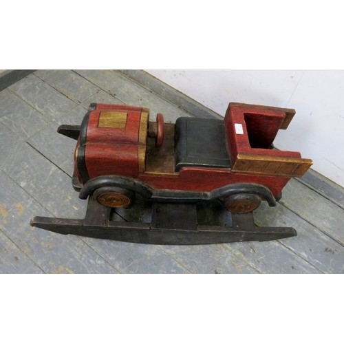 755 - A hardwood child’s rocking toy modelled as a vintage pick-up truck. H42cm W87cm D40cm approx.
Condit... 