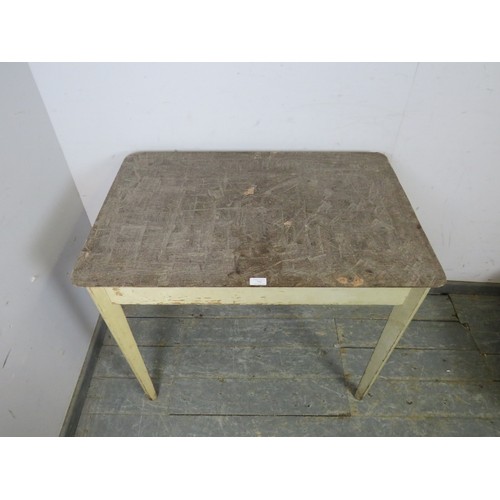 732 - A small mid century rectangular kitchen table, the scrubbed top on tapering supports painted cream a... 