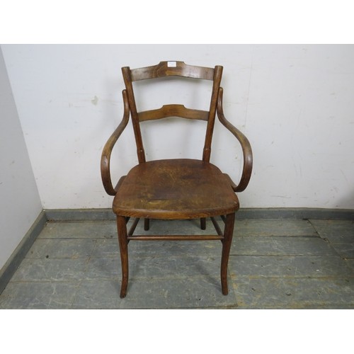 735 - An antique bentwood elbow chair/desk chair in the manner of Thonet, the seat with pokerwork decorati... 