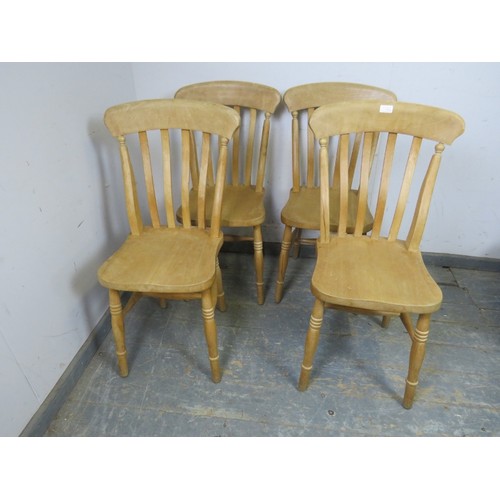 739 - A set of four beech slat-back farmhouse kitchen chairs, on turned supports with ‘H’ stretchers. 
H91... 