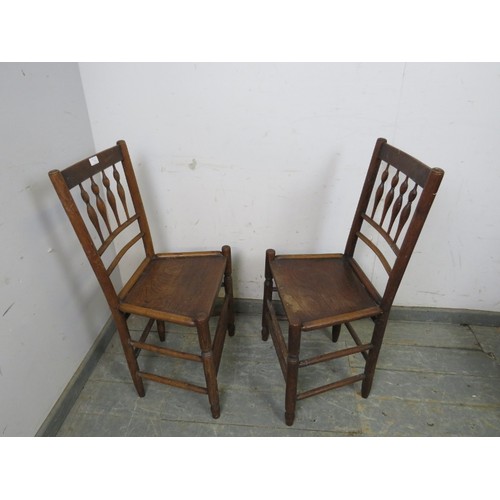 745 - A pair of antique French oak side chairs, having bobbin turned spindles, on turned supports with dou... 