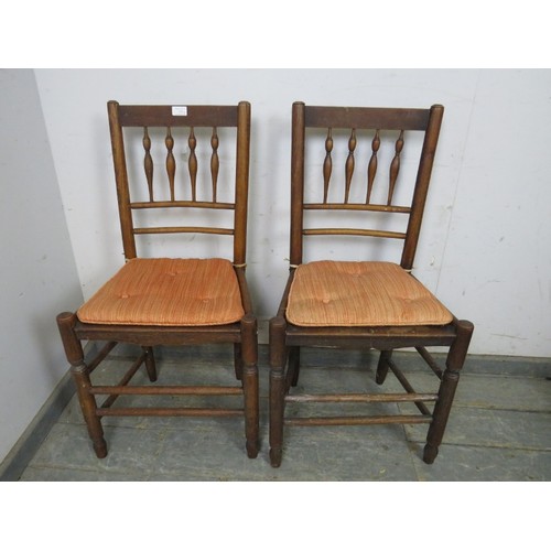 745 - A pair of antique French oak side chairs, having bobbin turned spindles, on turned supports with dou... 