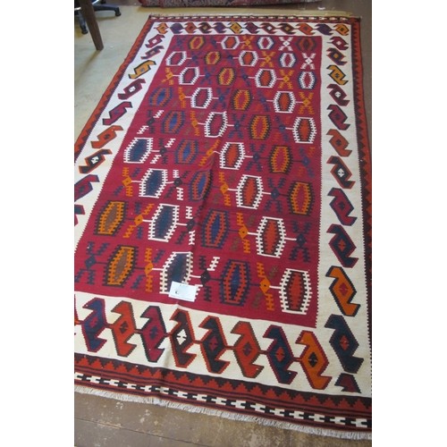 851 - South west Persian Qashqai Kilim repeat central pattern on red and cream ground.  285cm x 165cm appr... 