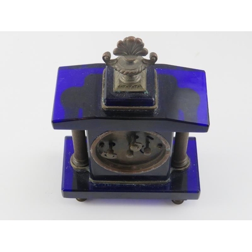 10 - A cobalt blue glass and brass mounted clock by Seikosha (Seiko), early 20th century. 19.5 cm height.... 