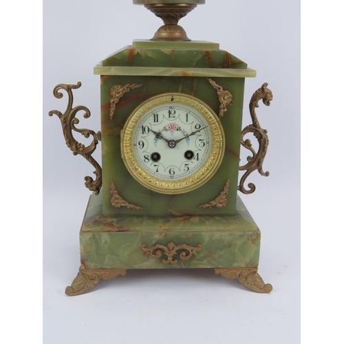 104 - An early 20th Century French green onyx mantel clock, with gilt metal mounts. Height 46cm.
Condition... 