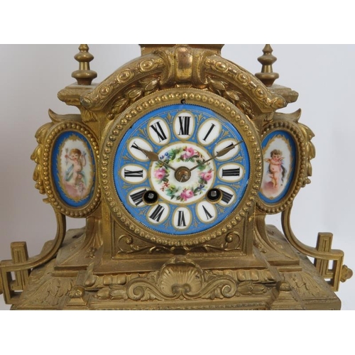 105 - Two late 19th century gilded French mantel clocks with hand decorated porcelain panels.  Both have J... 