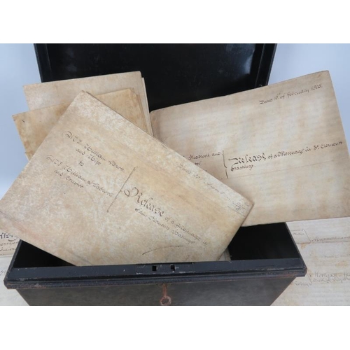 111 - A steel deed box full of 18th and 19th Century mortgages, indentures and other items.  Approx 25.
Co... 