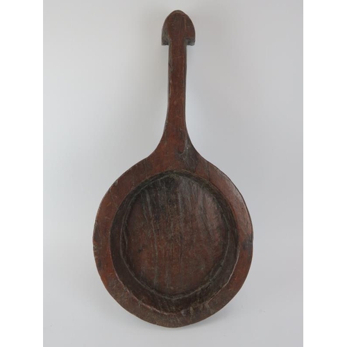 16 - An antique rustic hand carved oak serving bowl. 52.7 cm length.
Condition report: Some age related w... 