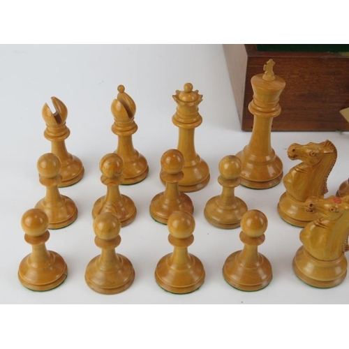 193 - A Jaques Staunton turned and carved ebony and boxwood chess set with base lined box, late 19th/early... 