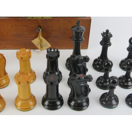 193 - A Jaques Staunton turned and carved ebony and boxwood chess set with base lined box, late 19th/early... 