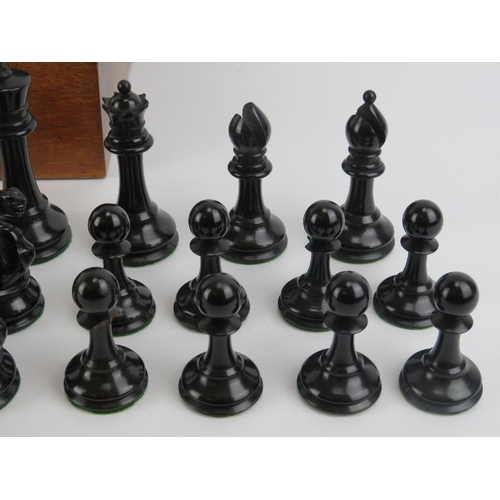 193 - A Jaques Staunton turned and carved ebony and boxwood chess set with base lined box, late 19th/early... 