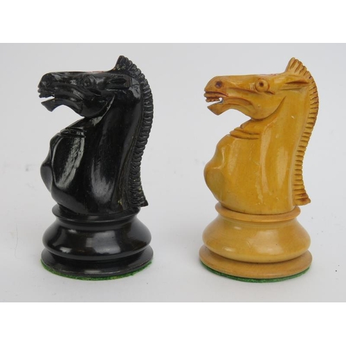 193 - A Jaques Staunton turned and carved ebony and boxwood chess set with base lined box, late 19th/early... 