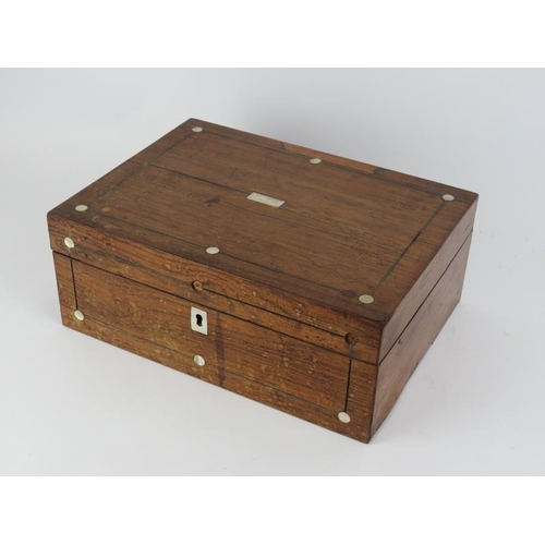 198 - A Victorian rosewood sewing box with contents. Inlaid mother of pearl decoration to the exterior. 30... 