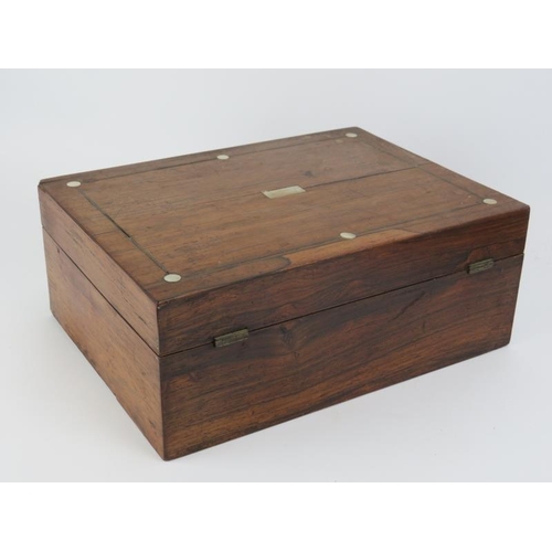 198 - A Victorian rosewood sewing box with contents. Inlaid mother of pearl decoration to the exterior. 30... 