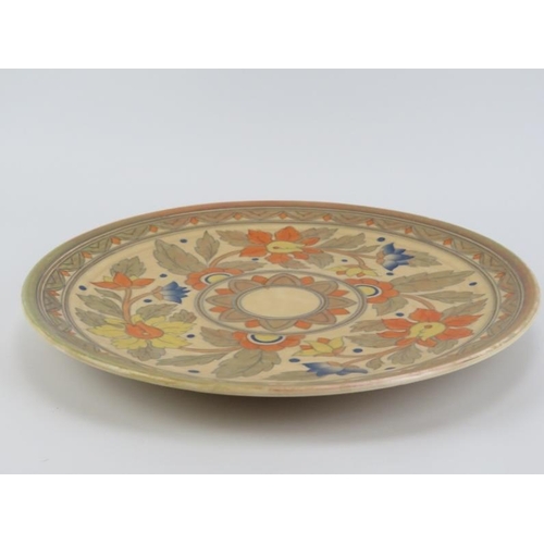 230 - A Crown Ducal charger designed by Charlotte Rhead. 36.6 cm diameter.
Condition report: Good conditio... 