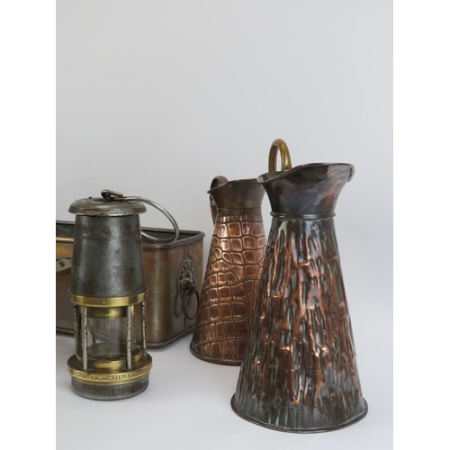 232 - A group of brass and copper wares and a bakelite bell, 19th/20th century. Notable items included a p... 