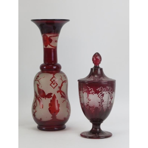 252 - A European ruby flash cut glass vase and urn with cover, a pair of tall Art Nouveau style glass vase... 