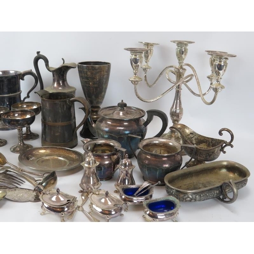 274 - A group of vintage/antique plated silver dining table wares, a candelabra and two trophies. (Quantit... 