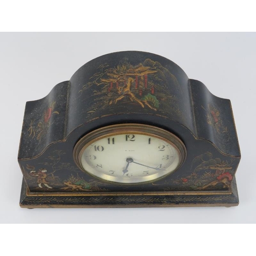 3 - A chinoiserie lacquered 8 Day mantel clock, early 20th century. 22.5 cm length.
Condition report:  L... 