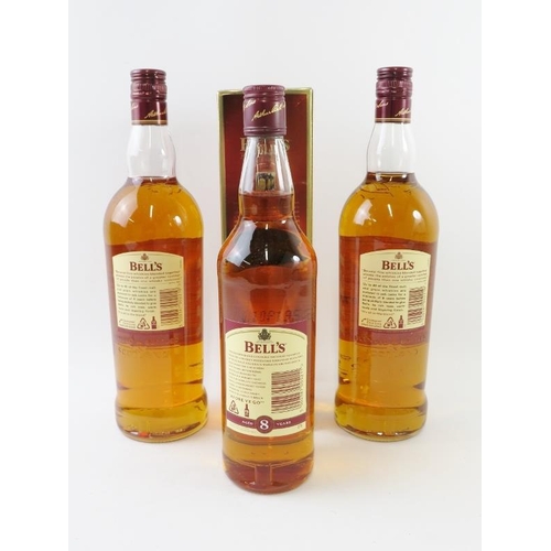 308 - 3 bottles: 2 litre bottles of Bells Extra Special 8 year old Scotch whisky, 100cl, 40% vol; 1 bottle... 