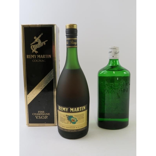 319 - 2 bottles: 1 bottle of Remy Martin Fine Champagne Cognac, boxed, 1990s bottling, 70cl, 40% vol; 1 bo... 