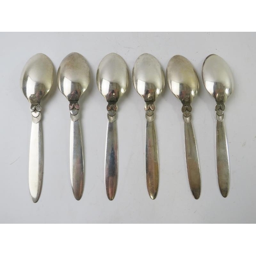 351 - Six Georg Jensen silver 'Cactus' design table spoons. Each bear Georg Jensen mark and stamped STERLI... 