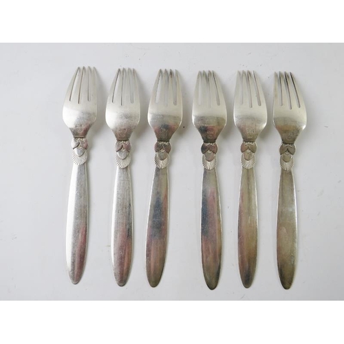 353 - Six Georg Jensen silver 'Cactus' design dinner forks. Each bear Georg Jensen mark and stamped STERLI... 