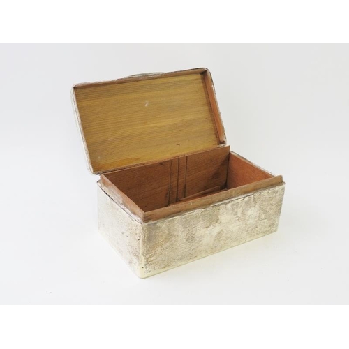 366 - A large silver cigarette box with cedar wood lining and weighted base.  Hallmarks rubbed. 17cm x 9cm... 