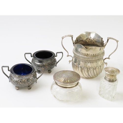 372 - A mixed lot of antique silver to include a double handled cream jug, a pair of glass lined salts and... 