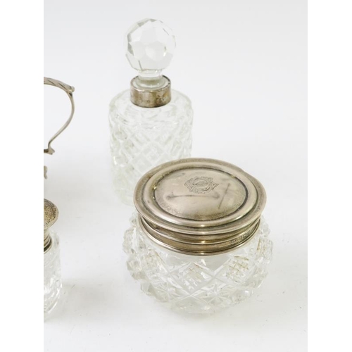 372 - A mixed lot of antique silver to include a double handled cream jug, a pair of glass lined salts and... 