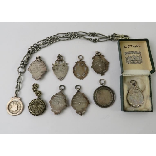 380 - Eight hallmarked silver medallion fobs, an unmarked RAF Athletic association medal and a base metal ... 